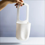 Kopholder med opbevaring – perfekt til sut, telefon og drikkevarer