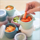 Flerfarvede babymadsbeholdere – hægtes sammen vandret for nem opbevaring