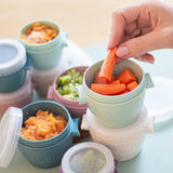 Flerfarvede babymadsbeholdere – hægtes sammen vandret for nem opbevaring