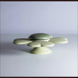 Suction Spinner fra Mushie – fastgøres på glatte overflader