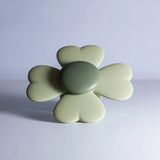 Mushie spinnerlegetøj – roterer ved berøring og stimulerer sanser