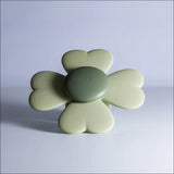 Mushie spinnerlegetøj – roterer ved berøring og stimulerer sanser