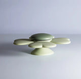 Suction Spinner fra Mushie – fastgøres på glatte overflader